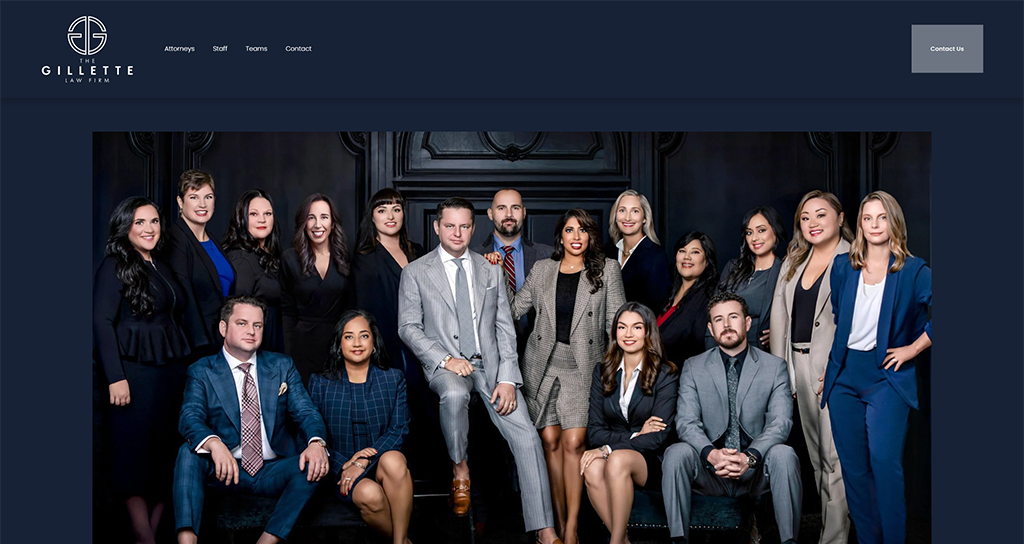 Group photo of the professional team at The Gillette Law Firm, showcasing attorneys and staff in a formal setting. The image highlights diversity and expertise, reflecting the firm's commitment to providing quality legal services.