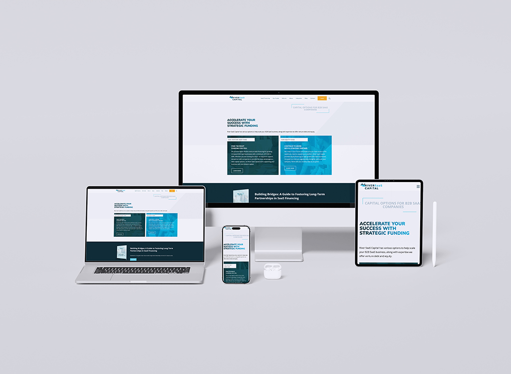 Image of multiple devices displaying a website focused on strategic funding for B2B SaaS companies. The desktop, laptop, tablet, and smartphone showcase a clean, modern design with sections emphasizing funding options and resources for accelerating business success.